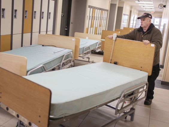 David Purdie, from St. Clair College, loading up hospital beds